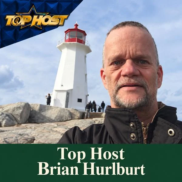 Brian Hurlburt, 2026 Top Host Competitor standing beside the Peggy’s Cove lighthouse, in Peggy’s Cove, Nova Scotia. Photo with the Top Host logo and the title “Top Host — Brian Hurlburt”.